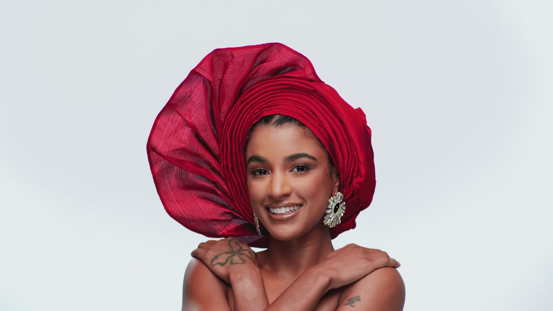 Angelina Swann-Red prestyled gele