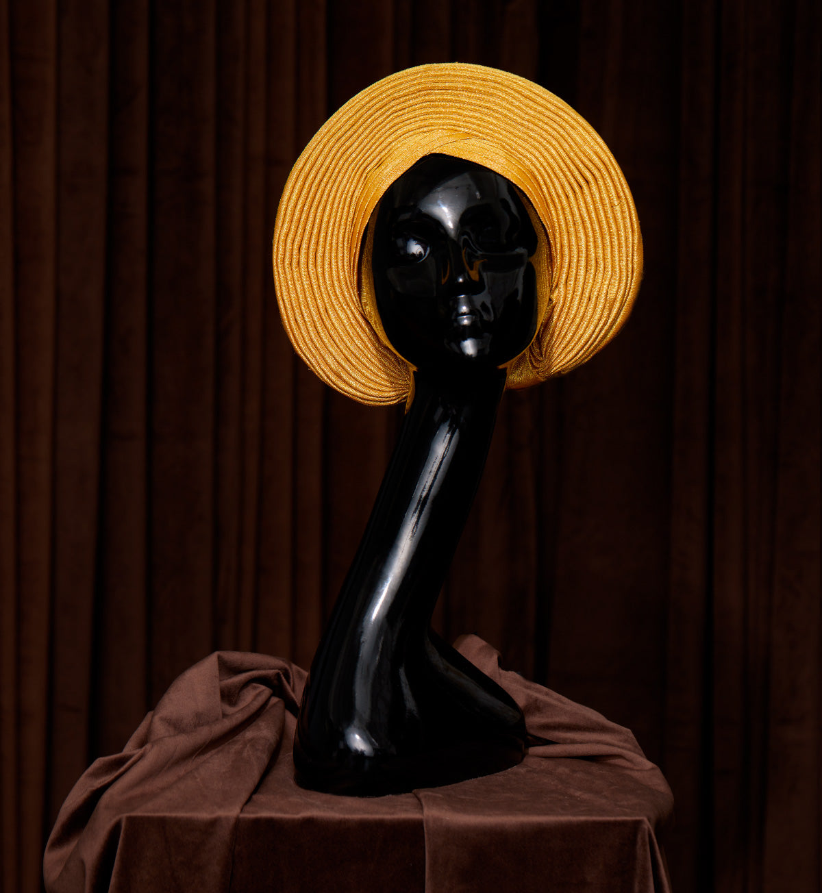 Angelina Swann Nigerian yellow gele with pleats