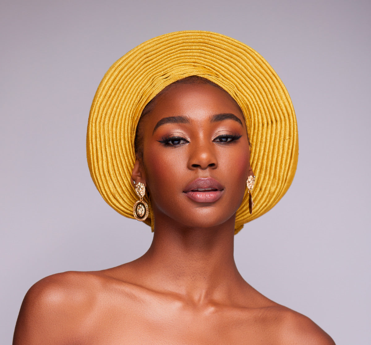 Angelina Swann V Shaped Nigerian gele