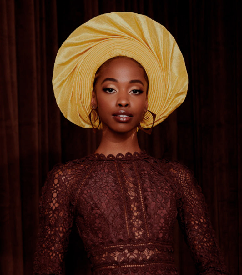 Angelina Swann yellow fan gele