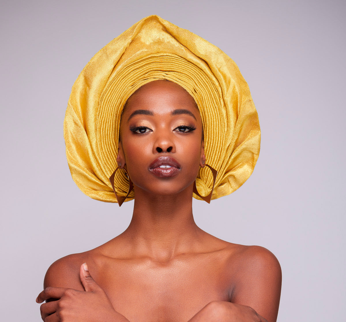 Angelina Swann-Old Gold prestyled nigerian gele