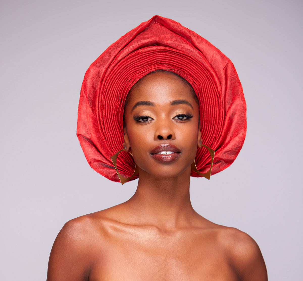 Angelina Swann: Ruby red prestyled nigerian gele